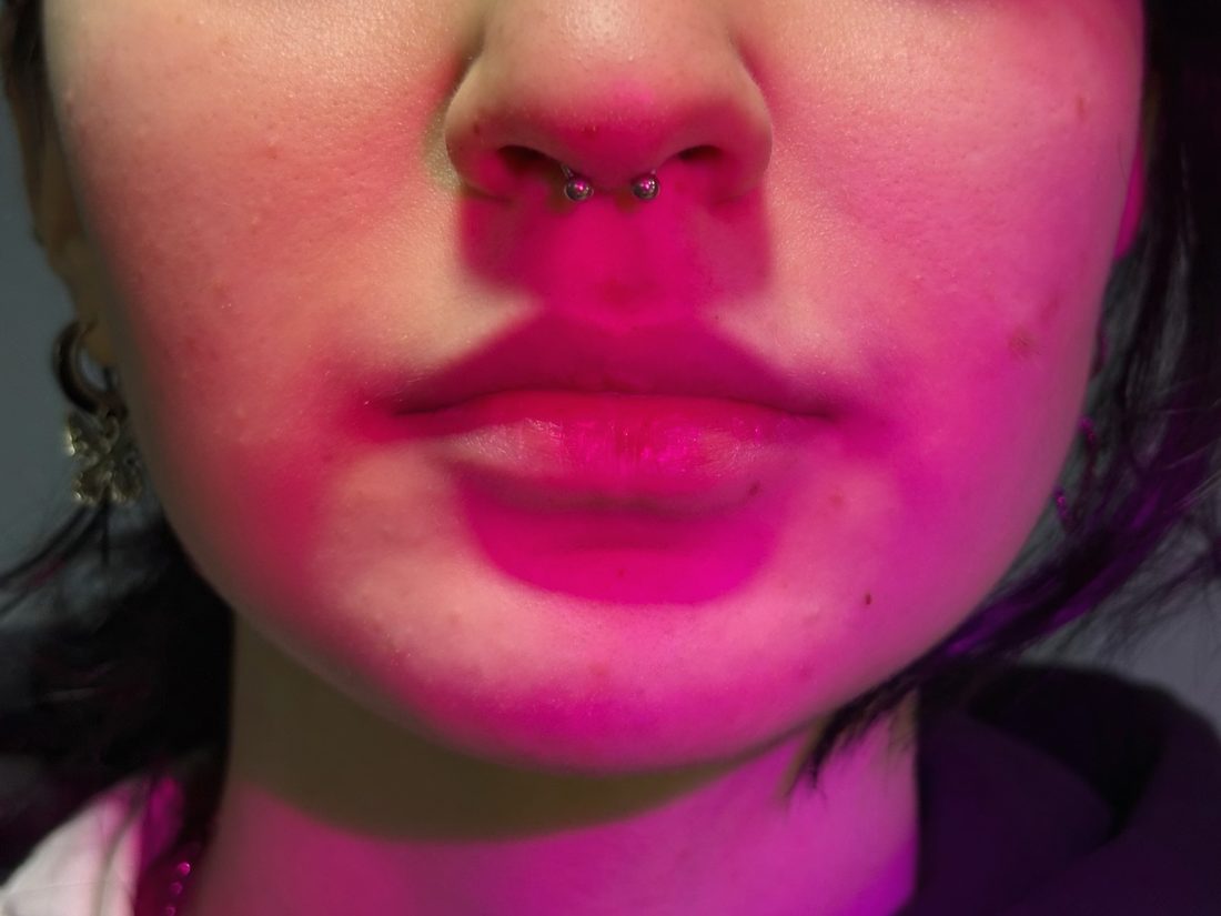 septum ring under pink uv light